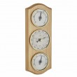 Station météorologique sur fond en pin massif